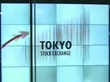           -  Nikkei   3,07%,  9237,82 