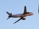       -   - Vueling Airlines - ,     